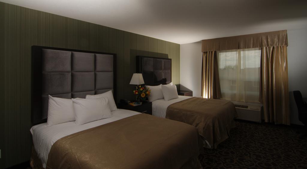 Paradise Inn And Suites Redwater Værelse billede