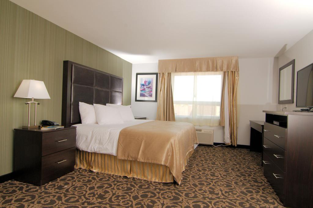 Paradise Inn And Suites Redwater Værelse billede